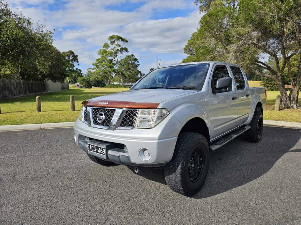 2010 Nissan Navara D40 RX Utility Dual Cab 4dr Man 6sp 4x4 875kg 2.5DT