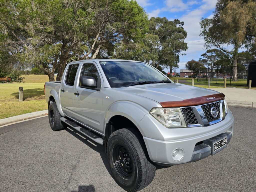 2010 Nissan Navara D40 RX Utility Dual Cab 4dr Man 6sp 4x4 875kg 2.5DT