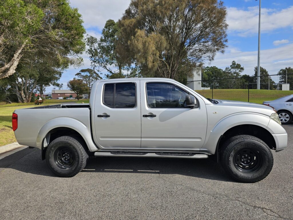 2010 Nissan Navara D40 RX Utility Dual Cab 4dr Man 6sp 4x4 875kg 2.5DT