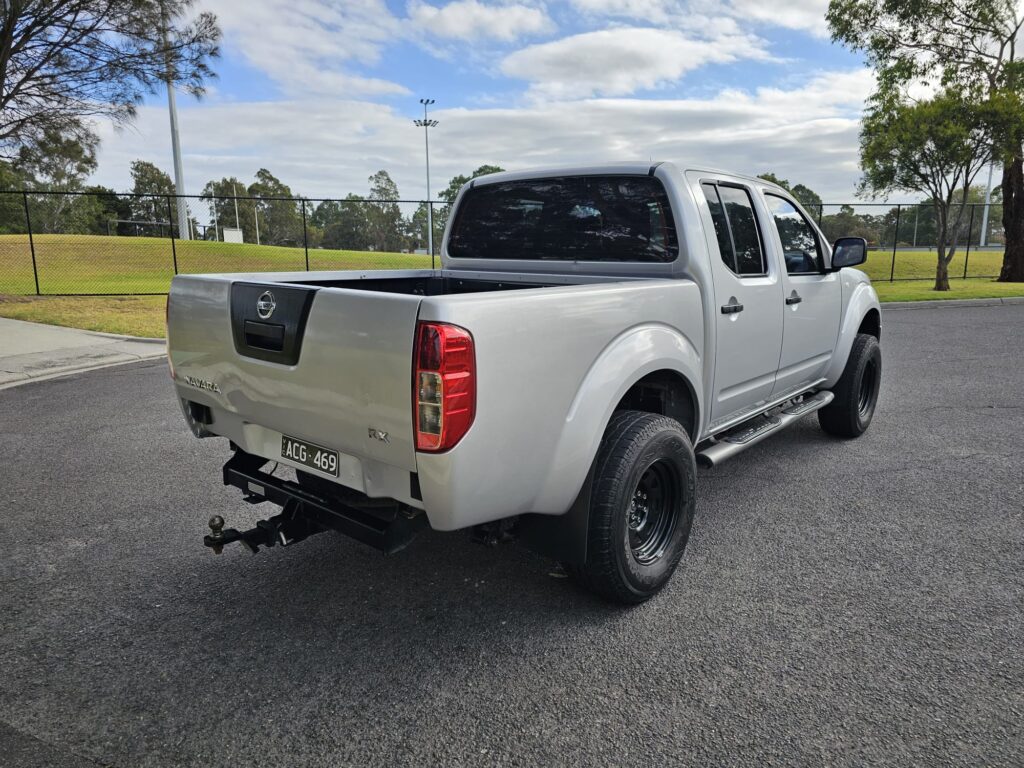 2010 Nissan Navara D40 RX Utility Dual Cab 4dr Man 6sp 4x4 875kg 2.5DT