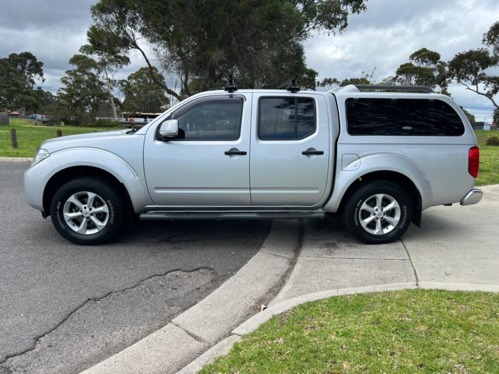 2013 Nissan Navara D40 S6 MY12 ST Utility Dual Cab 4dr Spts Auto 5sp 4x4 788kg 2.5DT P037 | 2DK7IX